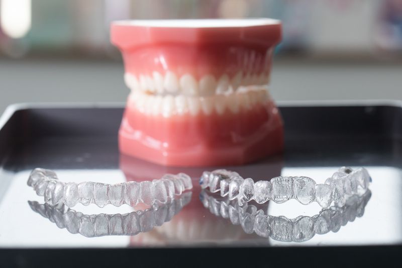 Invisalign vs Invisible Braces